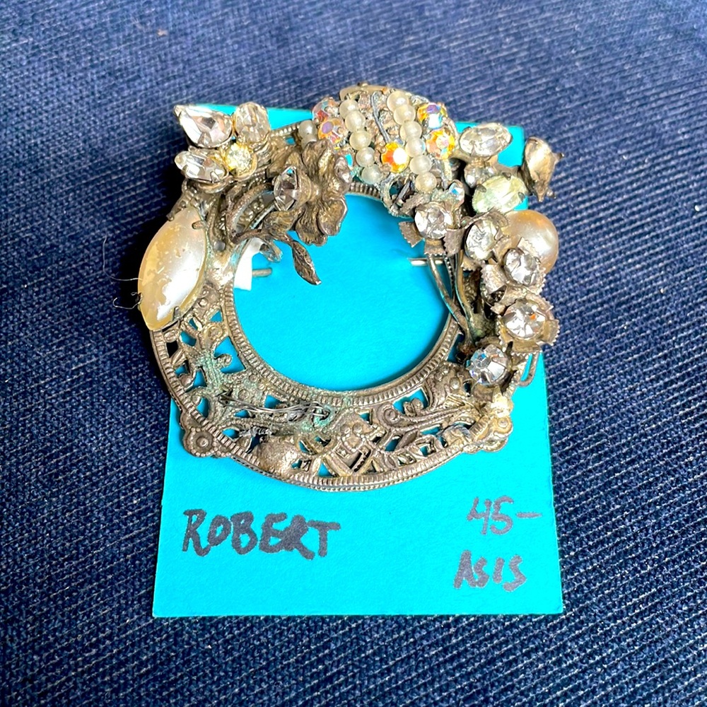 Vintage marked Robert silver brooch.